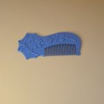 Декоративная расчёска с рельефным узором — изображение 1